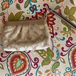 COACH Pouch Wristlet with zipper closure